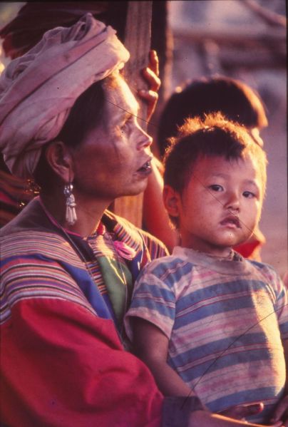 A Lisu boy standing with his grandmother. EFEO_KLEO00432