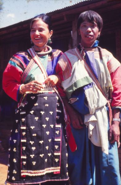 Dr. Otome Klein in a traditional Lisu costume is standing next to a Lisu man with makeup and wearing woman outfits. EFEO_KLEO00784