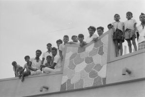 Mel Seval, maison Mujannar, villageois sur le toit d'un bâtiment EFEO_REIM08302